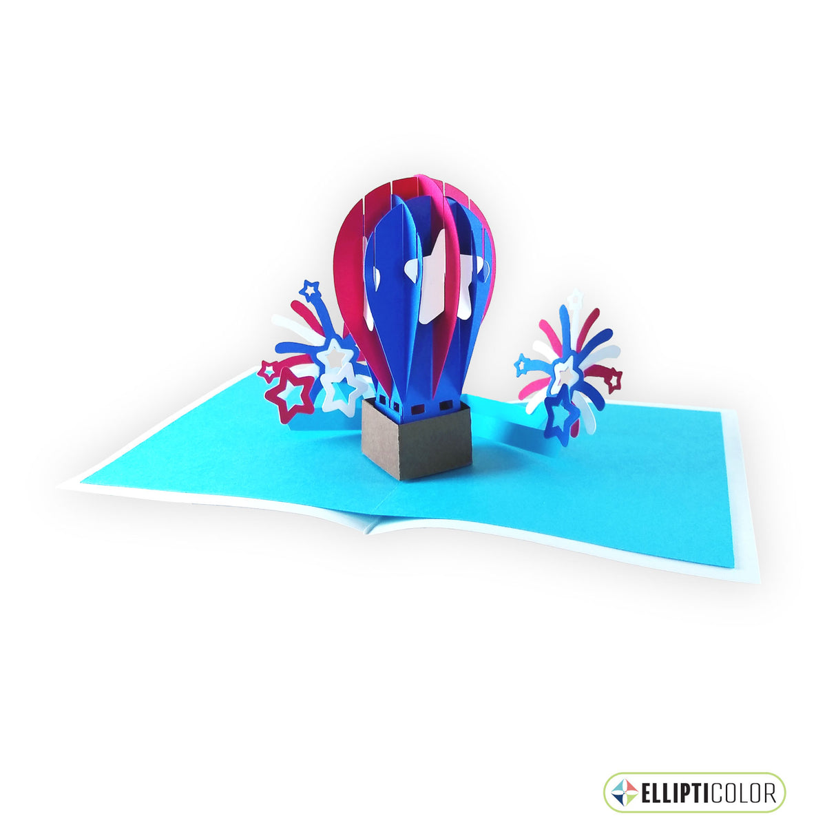 An intricate sliceform card featuring a pop-up patriotic hot air balloon and fireworks.
