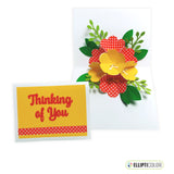A pop up card featuring bright red and yellow flowers with a 'Thinking of You' greeting on the front.