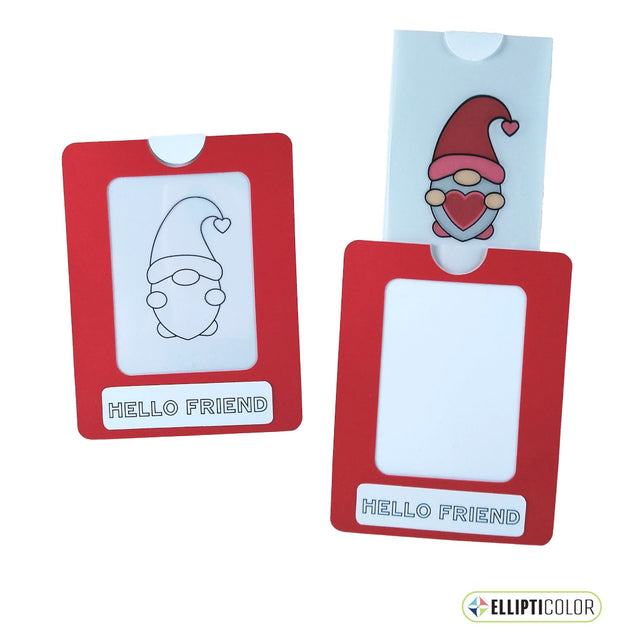 Magic slider card with a 'Hello Friend' message and a red frame around a gnome holding a heart that is black and white before the tab is pulled and colorful after