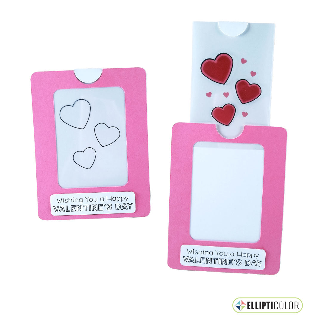 Magic slider card with a Valentine message and a pink frame around hearts that are black and white before the tab is pulled and colorful after