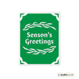 Green greeting card with 'Season's Greetings' text and white leaf designs on a white background