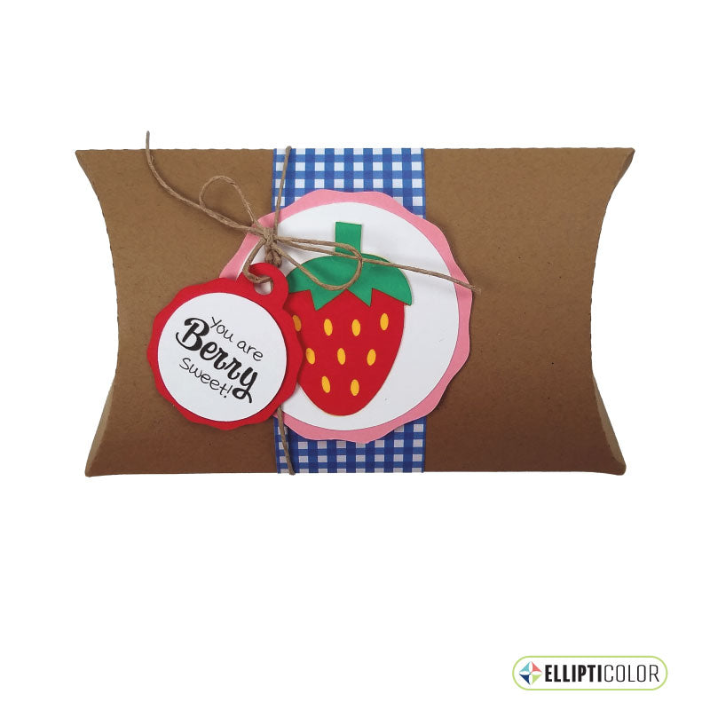 Kraft colored card stock pillow box embellished with a strawberry design and message