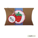 Kraft colored card stock pillow box embellished with a strawberry design and message